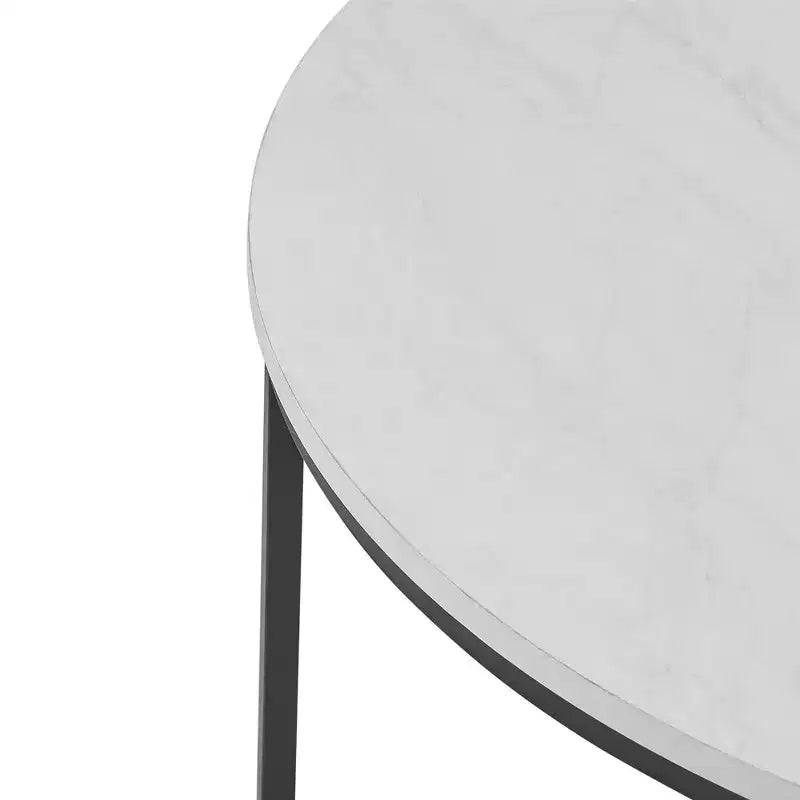 Table basse ronde à pieds croisés